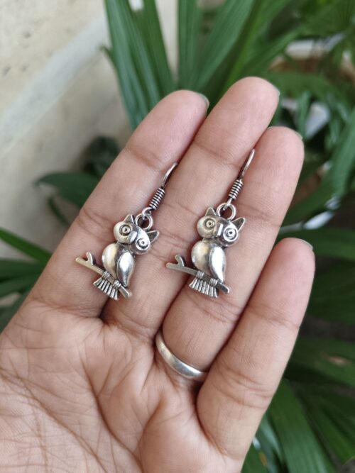 Handcrafted German silver owl earrings with vintage look.