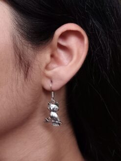 Handcrafted German silver owl earrings with vintage look.