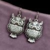 Unique owl design German silver vintage look earrings.