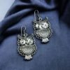 Unique owl design German silver vintage look earrings.