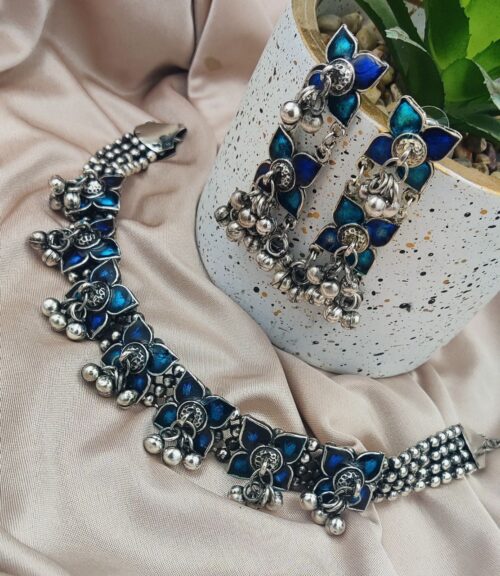 Unique silver plated choker necklace set with earrings.