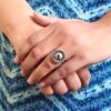 Antique style oxidized flower adjustable silver replica stone ring for women.