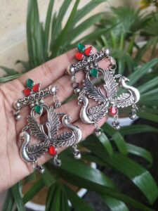 German Silver Peacock Stud Earrings | Traditional Oxidised Jewelry for Women - Color: "Red-Green"