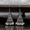 Oxidized German silver triangle jhumka earrings with pearl beads.