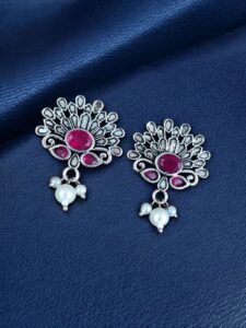 German Silver Unique Stud Earrings | Ethnic Pearl & Stone Work Jewelry - color: "Red"