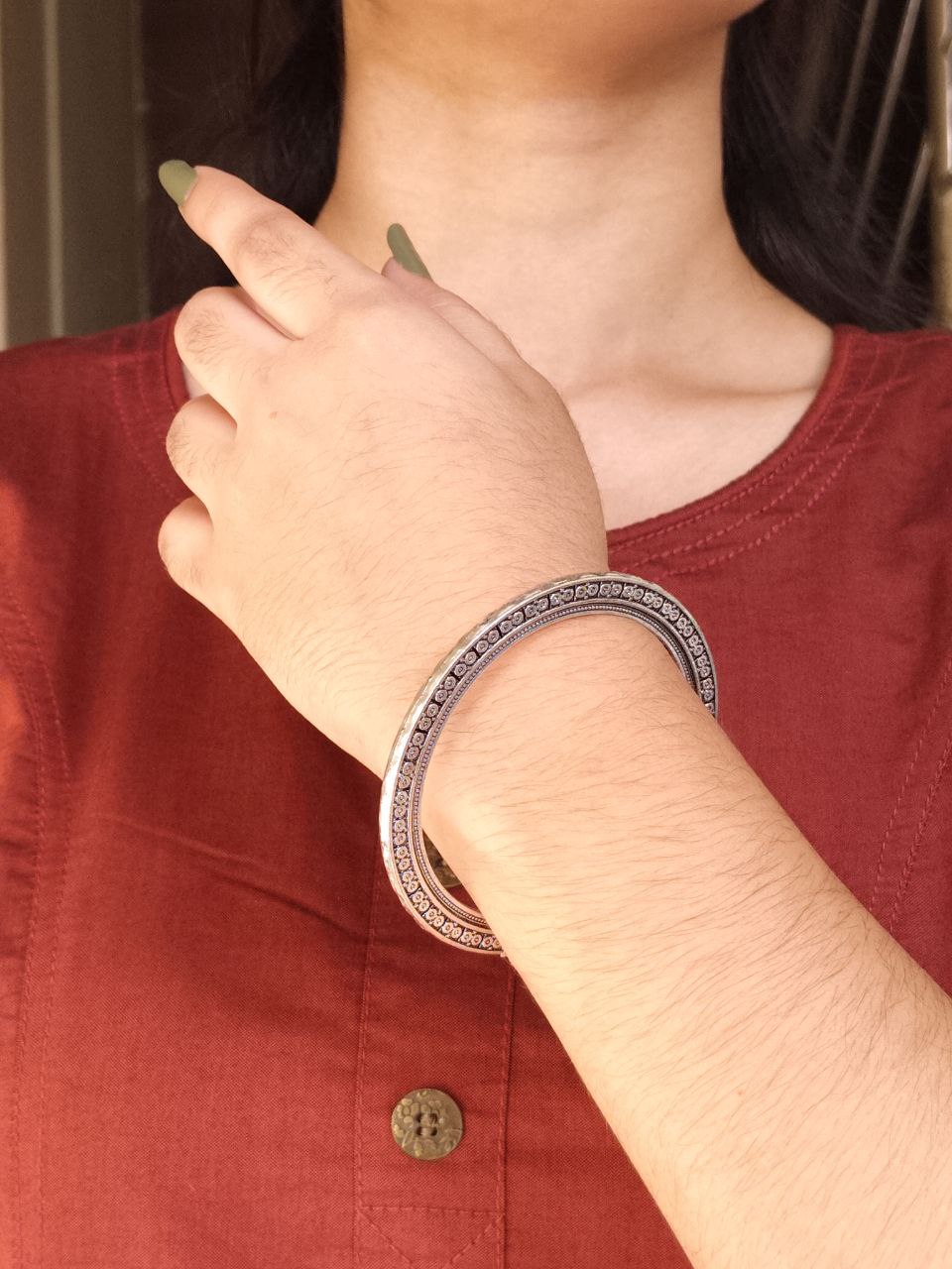 Ethnic Oxidized Bangle – German Silver Look-Alike Perfect Jewelry 1 silver plated ethnic Oxidized bangle in German silver look-alike finish with traditional Indian design.