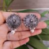 Vintage German silver stud earrings with pearl detailing for daily wear.