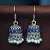 German silver pearl jhumka earrings with stone hook dangler design.