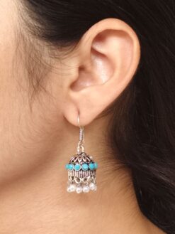German silver pearl jhumka earrings with stone hook dangler design.