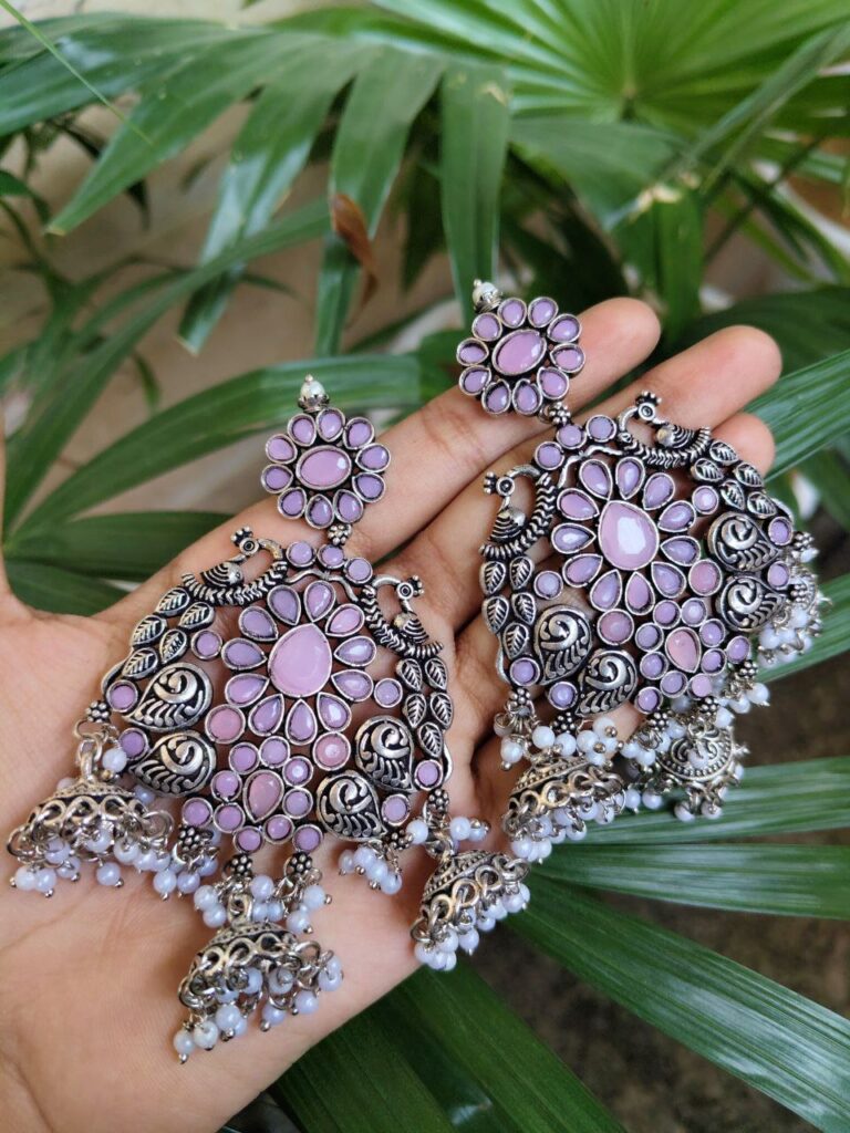 Long Peacock Dangler Earrings With Elegant Stone Work And Pearl Detailing