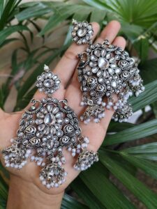 Long Peacock Dangler Earrings With Elegant Stone Work And Pearl Detailing - color: "White"