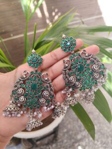 Long Peacock Dangler Earrings With Elegant Stone Work And Pearl Detailing - color: "Green"