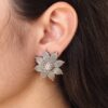 Trendy oxidized flower stud earrings in silver replica finish for daily wear