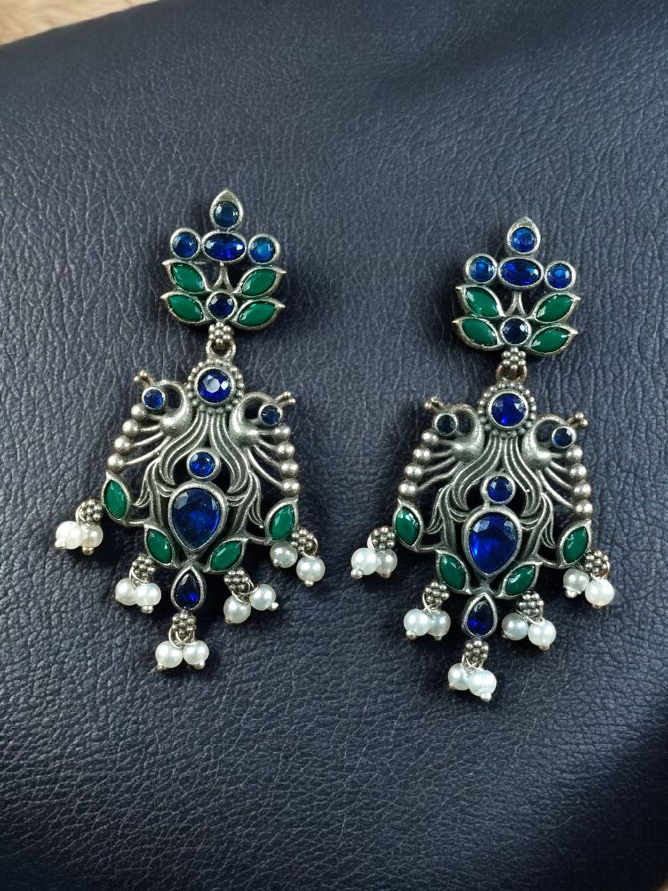 Elegant Peacock Design Earrings | Silver Replica Dangler with Stone & Pearl Detailing Best Jewelry 3 Silver replica peacock dangler earrings with pearl and stone work