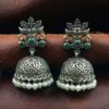 Oxidized silver floral art jhumka earrings with pearl work and vintage finish.
