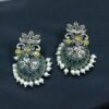 Oxidized silver floral art jhumka earrings with pearl work and vintage finish.