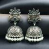 Oxidized silver floral art jhumka earrings with pearl work and vintage finish.