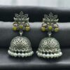 Oxidized silver floral art jhumka earrings with pearl work and vintage finish.