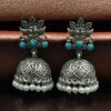 Oxidized silver floral art jhumka earrings with pearl work and vintage finish.