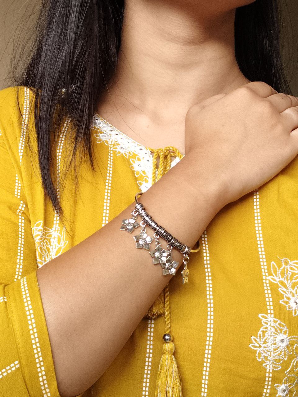 Traditional German Silver Flower Charm Bangles | Beautiful Ethnic Handcrafted Jewelry 1 Traditional German silver with flower charm bangles ethnic handcrafted design.