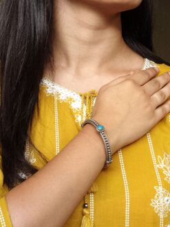 Antique look silver plated openable kada with stone work for women.