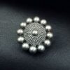 Oxidized round design silver replica hair pin for bun styling.