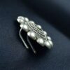 Oxidized round design silver replica hair pin for bun styling.