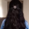 Oxidized round design silver replica hair pin for bun styling.