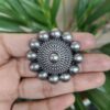 Oxidized round design silver replica hair pin for bun styling.