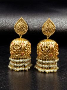 Traditional Floral Art Gold Plated Jhumka Earrings | Stone & Pearl Detailing Unique Dangler Jewelry For Women - color: "Baby Pink"