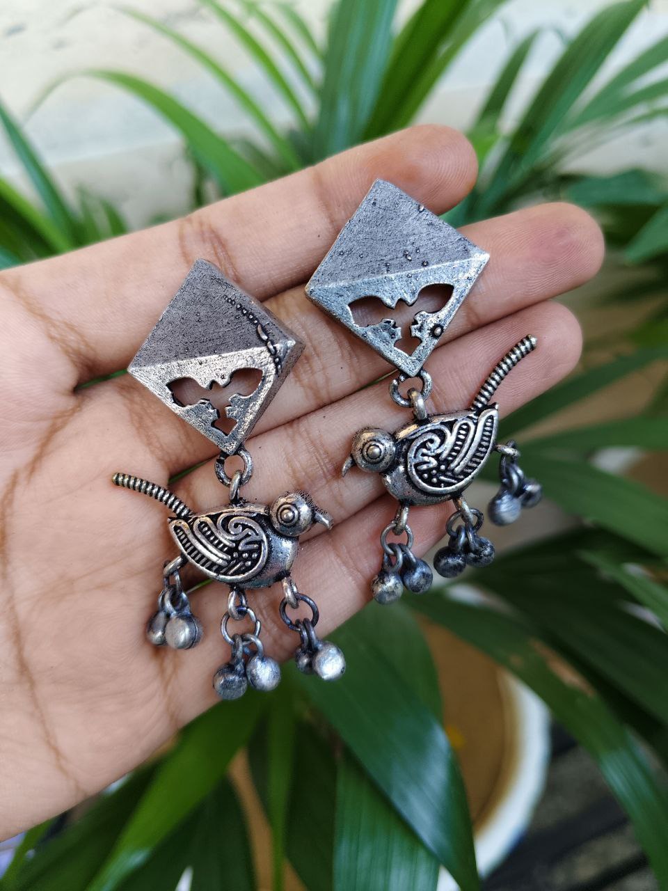 Oxidized Bird Dangler Earrings With Traditional Ghungroo Detailing 1 Oxidized Bird Dangler Earrings With Traditional Ghungroo Detailing