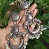Oxidized Chandbali Earrings With Fish Motif, Floral Art, And Elegant Pearl Work