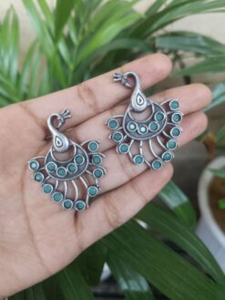 Silver Plated Peacock Design Earrings With Elegant Stone Work Detailing