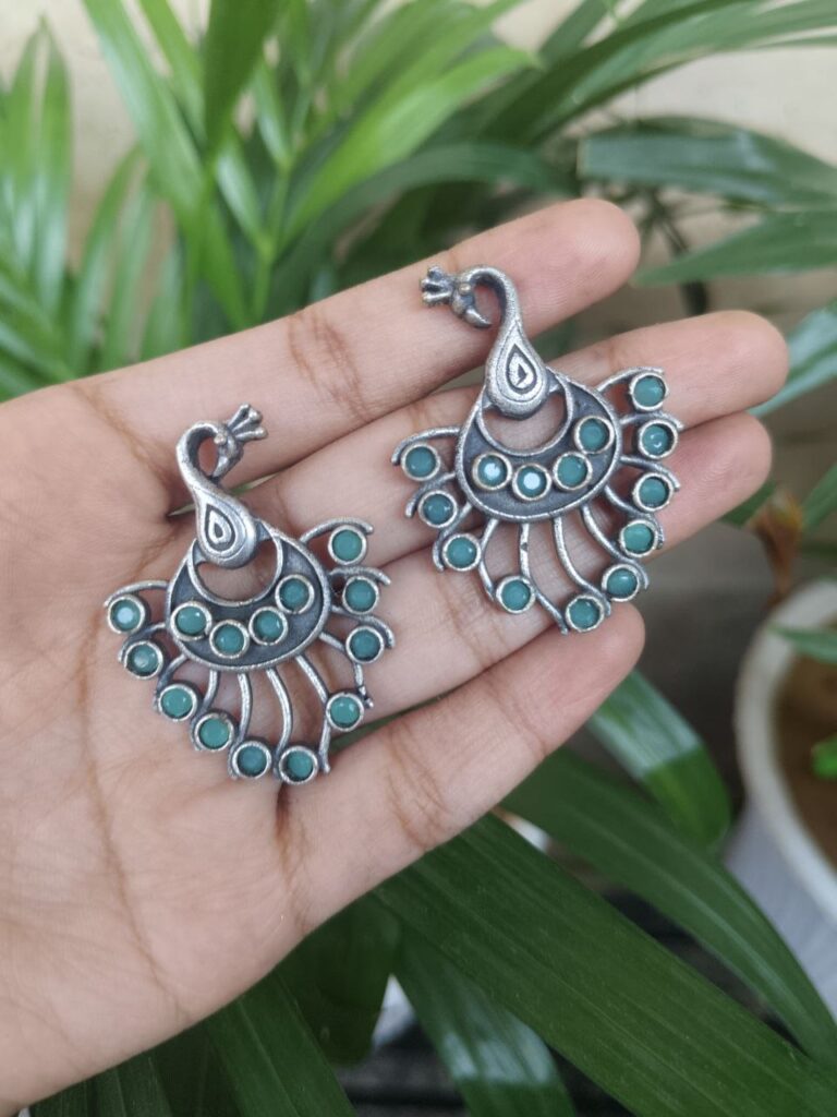 Silver Plated Peacock Design Earrings With Elegant Stone Work Detailing