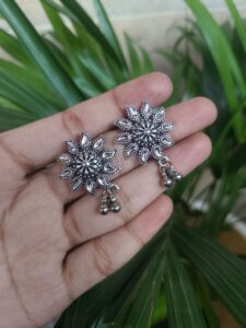 Silver Plated Flower Stud Earrings With Elegant Ghungroo Detailing