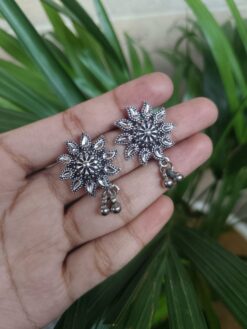 Silver Plated Flower Stud Earrings With Elegant Ghungroo Detailing