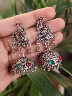 Oxidized Peacock Jhumka Dangler Earrings With Elegant Stone Work Design
