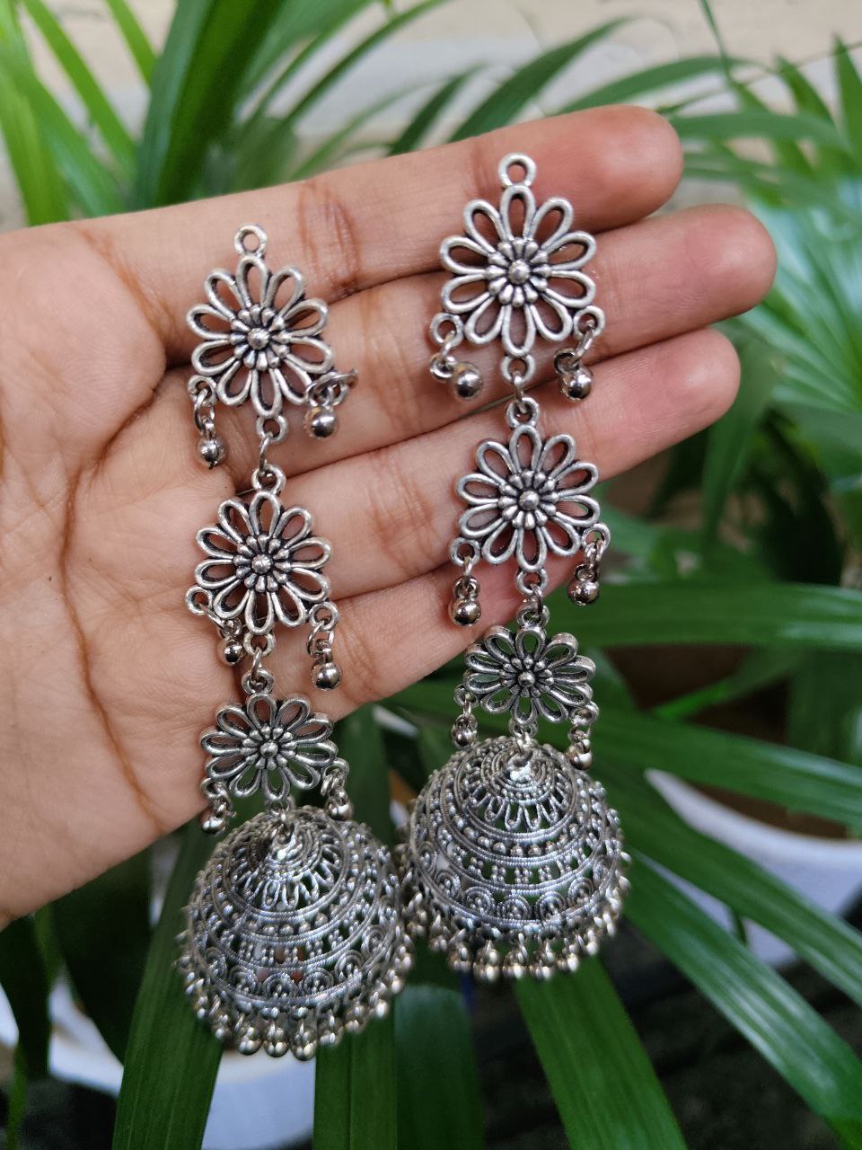 Beautiful German Silver Flower Jhumka Dangler Earrings with Elegant Ghungroo Detailing for Women 1 Beautiful German Silver Flower Jhumka Dangler Earrings with Elegant Ghungroo Detailing for Women