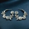 Handcrafted oxidized flower design silver replica earrings for daily wear.