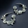 Handcrafted oxidized flower design silver replica earrings for daily wear.