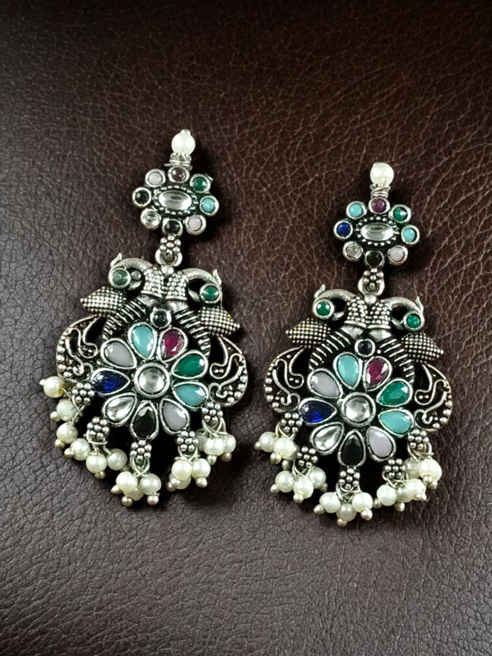 Silver Plated Peacock Dangler Earrings with Stone and Pearl – Best Ethnic Jewelry for Women 9 Silver plated peacock dangler earrings with stone and pearl detailing