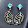 Oxidized silver replica peacock feather design dangler earrings for women.