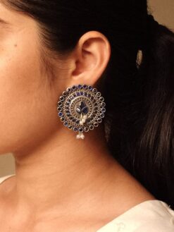 Oxidized round stud earrings with pearl and stone detailing