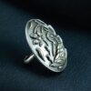 Oxidized silver replica peacock floral adjustable ring