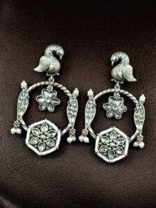 Beautiful Bird Design Earrings | Oxidized Silver Replica Stone & Pearl Work Dangler Jewelry - color: "White"
