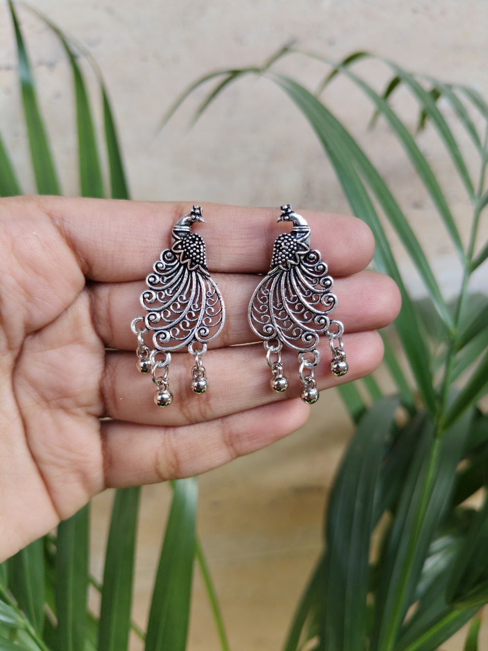 Peacock Stud Earrings with Traditional Ghungroo Detailing for Women’s Ethnic Style 1 Peacock Stud Earrings with Traditional Ghungroo Detailing for Women’s Ethnic Style