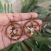 Spiral Ring Hanging Flower Hook Earrings with Intricate Stone Work Traditional Design