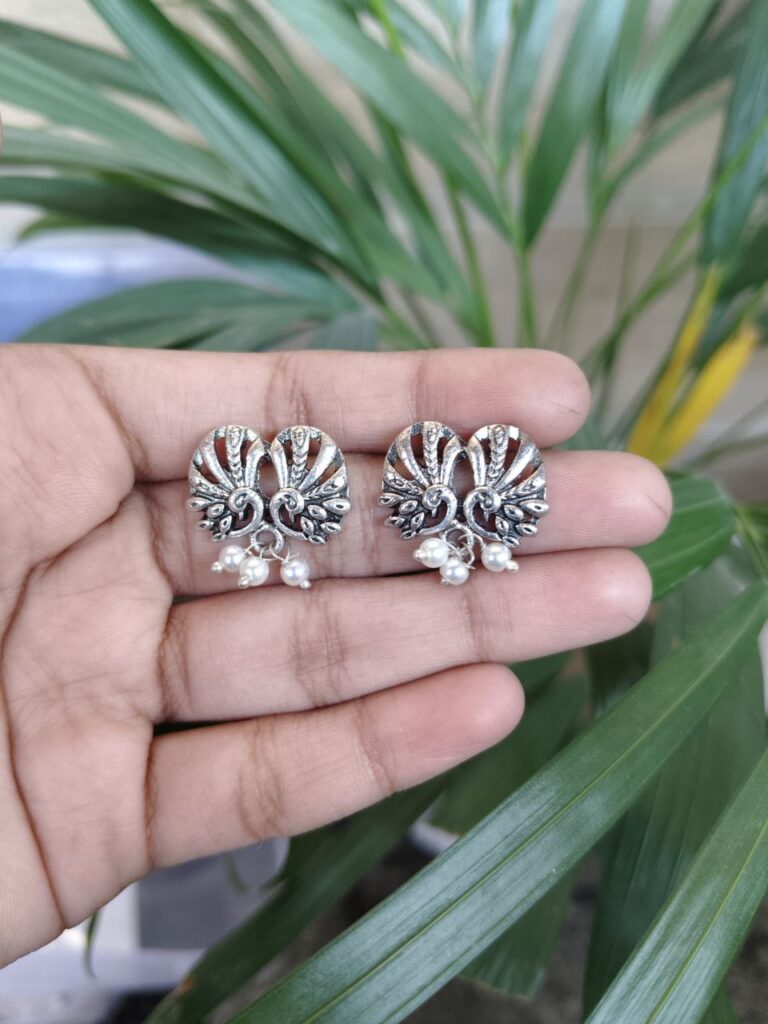 Peacock Design German Silver Stud Earrings with Elegant Pearl Work