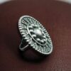 Oxidized silver replica adjustable ring with unique artistic design.