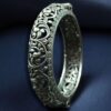 Openable oxidized silver replica floral art kada bangle for women.